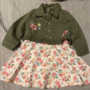 Little Lass, 18 month girl, white w/green jacket